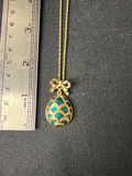 Three necklaces: gold-tone pendant necklace, silver-toned necklace, and multicolor beaded necklace - thumbnail 6 of 11