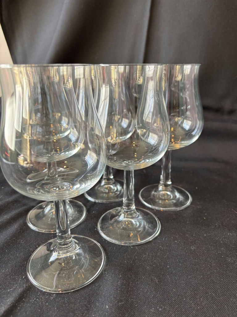 Assorted stemmed glasses and vintage floral porcelain cup with saucer - image 1 of 12