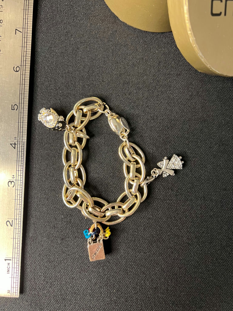 Gold-tone jewelry collection with heart pendant, charm bracelet, and drop earrings - image 11 of 18