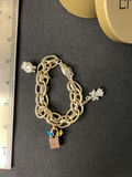 Gold-tone jewelry collection with heart pendant, charm bracelet, and drop earrings - thumbnail 11 of 18