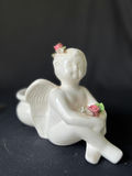 Ceramic angel planter, nesting heart dishes, and iridescent, Carnival Glass fruit bowl - thumbnail 1 of 7