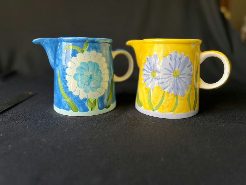 Pair of small ceramic pitchers with blue and yellow floral glaze - image 1 of 4