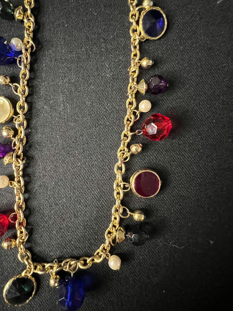 Gold-tone beaded necklace with multicolored charms and red enamel crescent earrings - image 2 of 8