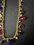 Gold-tone beaded necklace with multicolored charms and red enamel crescent earrings - thumbnail 2 of 8