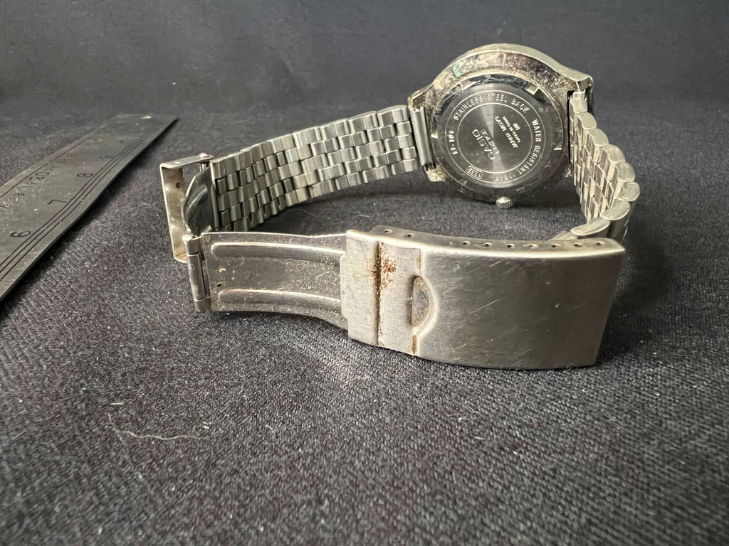 Vintage Casio Edifice EF-104 quartz watch and Vintage eagle-embossed lighter - image 2 of 8