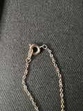 Three necklaces: gold-tone pendant necklace, silver-toned necklace, and multicolor beaded necklace - thumbnail 3 of 11