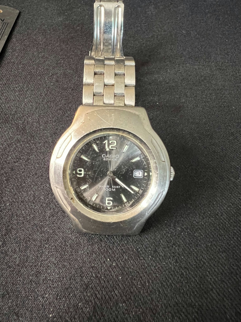 Vintage Casio Edifice EF-104 quartz watch and Vintage eagle-embossed lighter - image 3 of 8