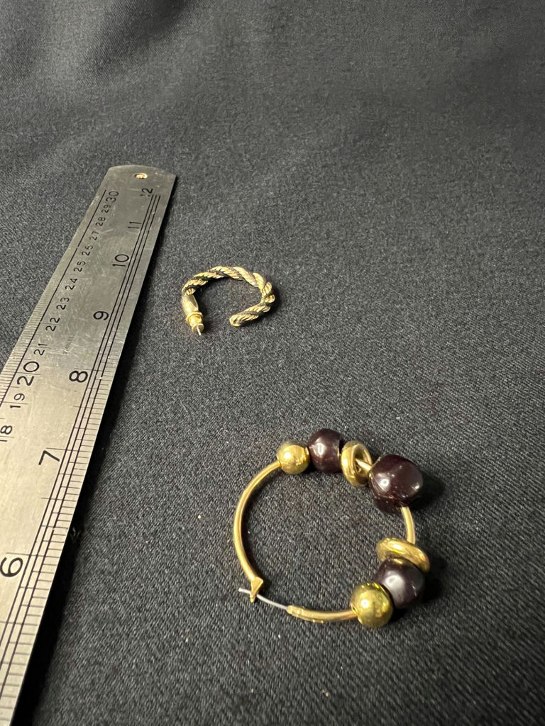 Gold-tone jewelry collection with deer charm and beaded hoops - image 10 of 12