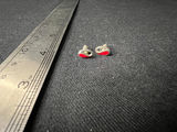 Three pairs of earrings: red enamel studs, color‑enamel hoops, and gold-tone pearl studs - thumbnail 1 of 9