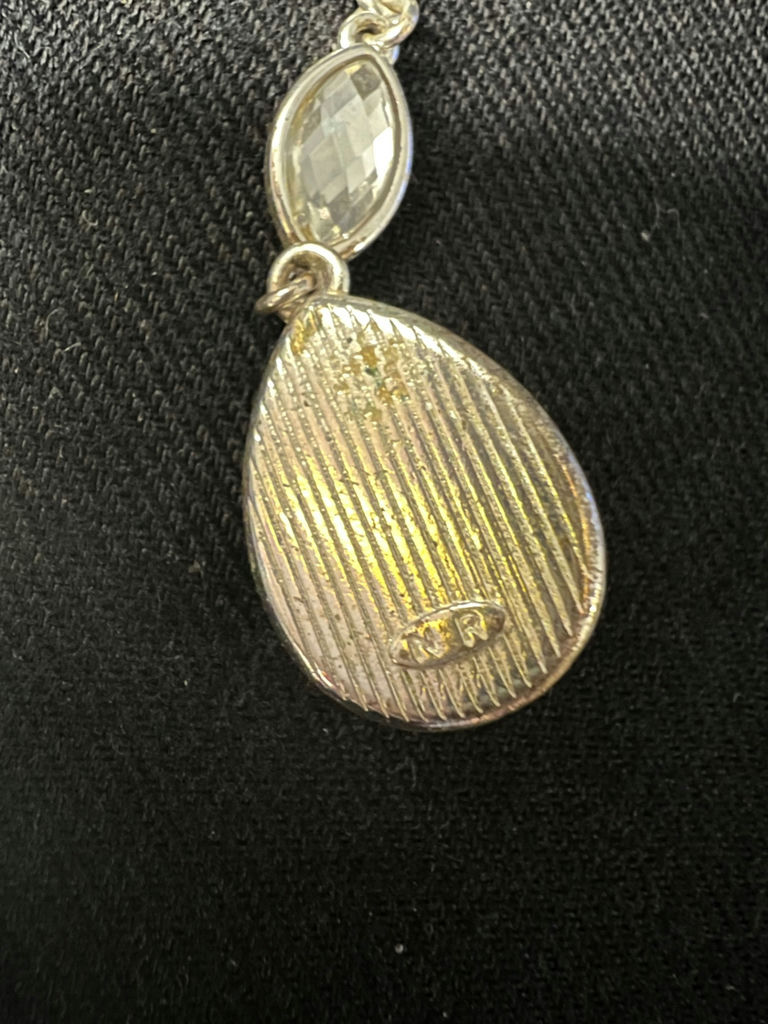 Silver-tone necklace with crystal drop pendant and one pair of shell earrings (blue enamel and gold-tone) - image 4 of 6