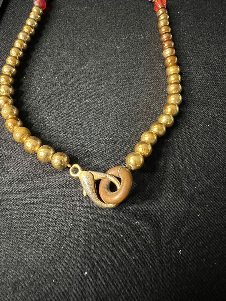 Gold-tone floral pendant necklace, two multicolor beaded necklaces, and matching bead earrings - image 8 of 13