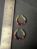 Three pairs of earrings: red enamel studs, color‑enamel hoops, and gold-tone pearl studs - thumbnail 7 of 9