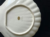 Ceramic dishware set with scalloped bowls and decorative plates - thumbnail 8 of 8