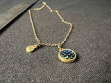Silver-toned necklace with iridescent round pendant and 'BFF' charm - thumbnail 2 of 6