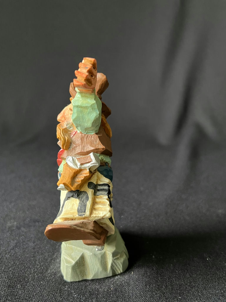 Colorful flower sculpture with hummingbird and cowboy figurine - image 10 of 11