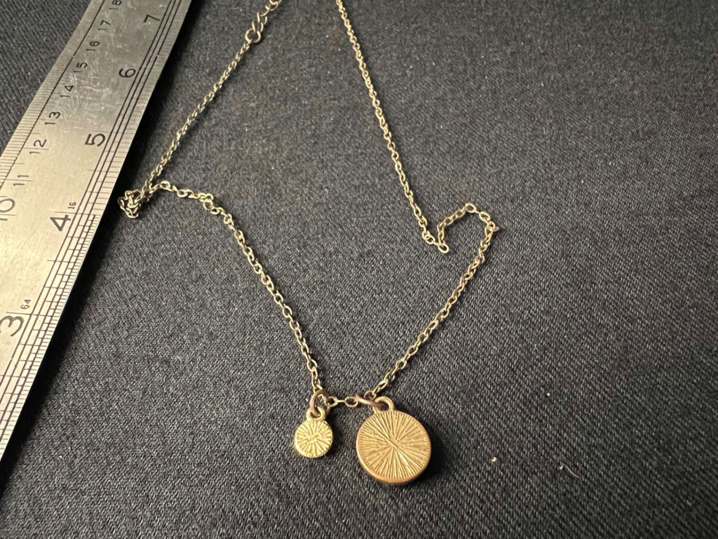 Silver-toned necklace with iridescent round pendant and 'BFF' charm - image 4 of 6