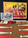 Vintage board game collection including Trivial Pursuit, Backgammon, Checkers, and Planet Hollywood - thumbnail 14 of 20