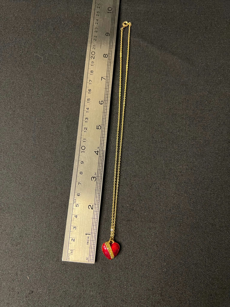 Gold-tone jewelry collection with heart pendant, charm bracelet, and drop earrings - image 1 of 18