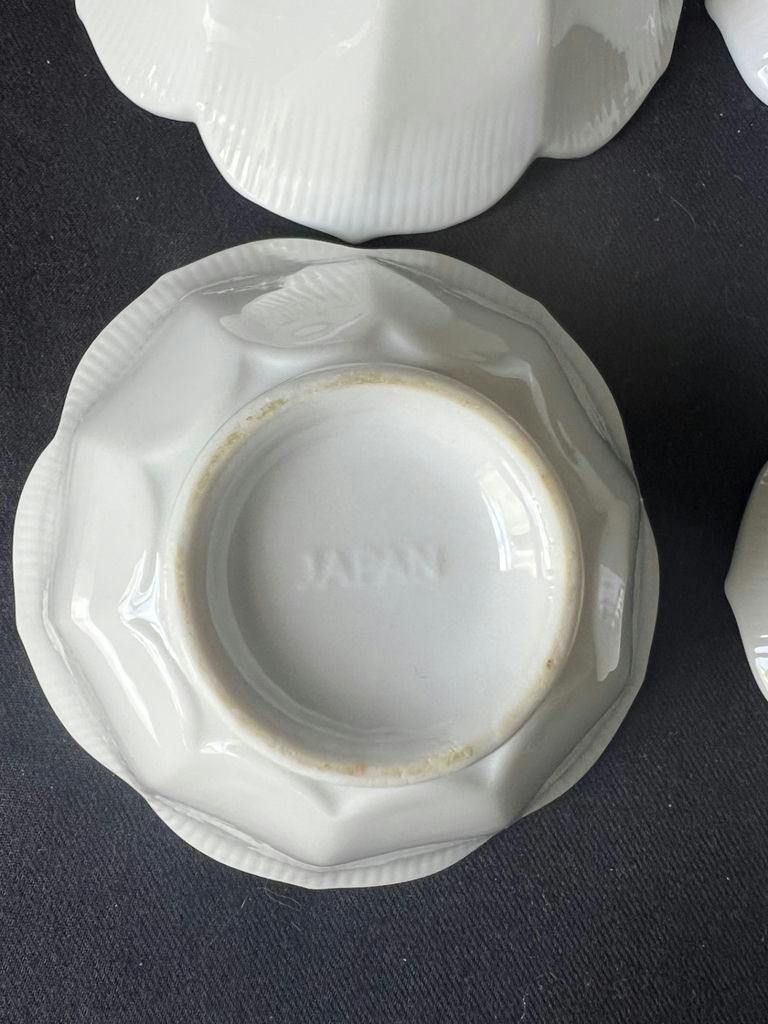 Ceramic dishware set with scalloped bowls and decorative plates - image 2 of 8