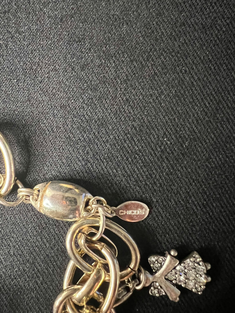 Gold-tone jewelry collection with heart pendant, charm bracelet, and drop earrings - image 13 of 18