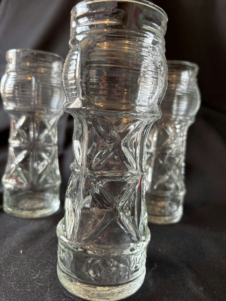 Three tall ribbed glass tiki glasses, round candle holder, and two star-shaped glass candle holders - image 3 of 10