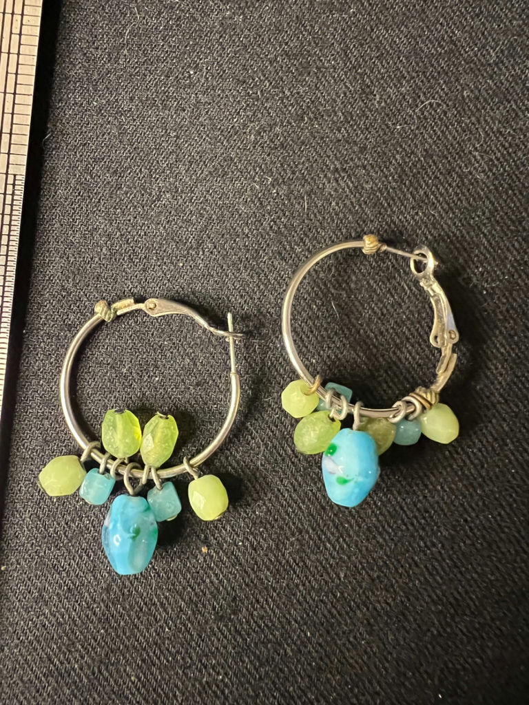Gold-tone bracelet with engraved shield links, beaded hoop earrings, and a wire bow ornament - image 9 of 10