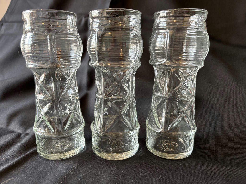 Three tall ribbed glass tiki glasses, round candle holder, and two star-shaped glass candle holders - image 2 of 10