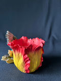 Colorful flower sculpture with hummingbird and cowboy figurine - thumbnail 2 of 11