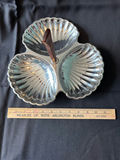 Vintage three-section shell-shaped serving dish with wooden handle, antique creamer pitcher, and embossed glass plate - thumbnail 2 of 8