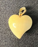 Vintage Ivory heart pendant, duck charm ring, and green-bead ring - thumbnail 1 of 11