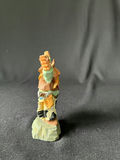 Colorful flower sculpture with hummingbird and cowboy figurine - thumbnail 9 of 11