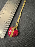 Gold-tone jewelry collection with heart pendant, charm bracelet, and drop earrings - thumbnail 3 of 18
