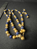 Gold-tone floral pendant necklace, two multicolor beaded necklaces, and matching bead earrings - thumbnail 10 of 13