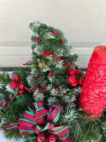 Vintage Evergreen Christmas cherub wreath and decorative greens with candle and vases - thumbnail 9 of 12