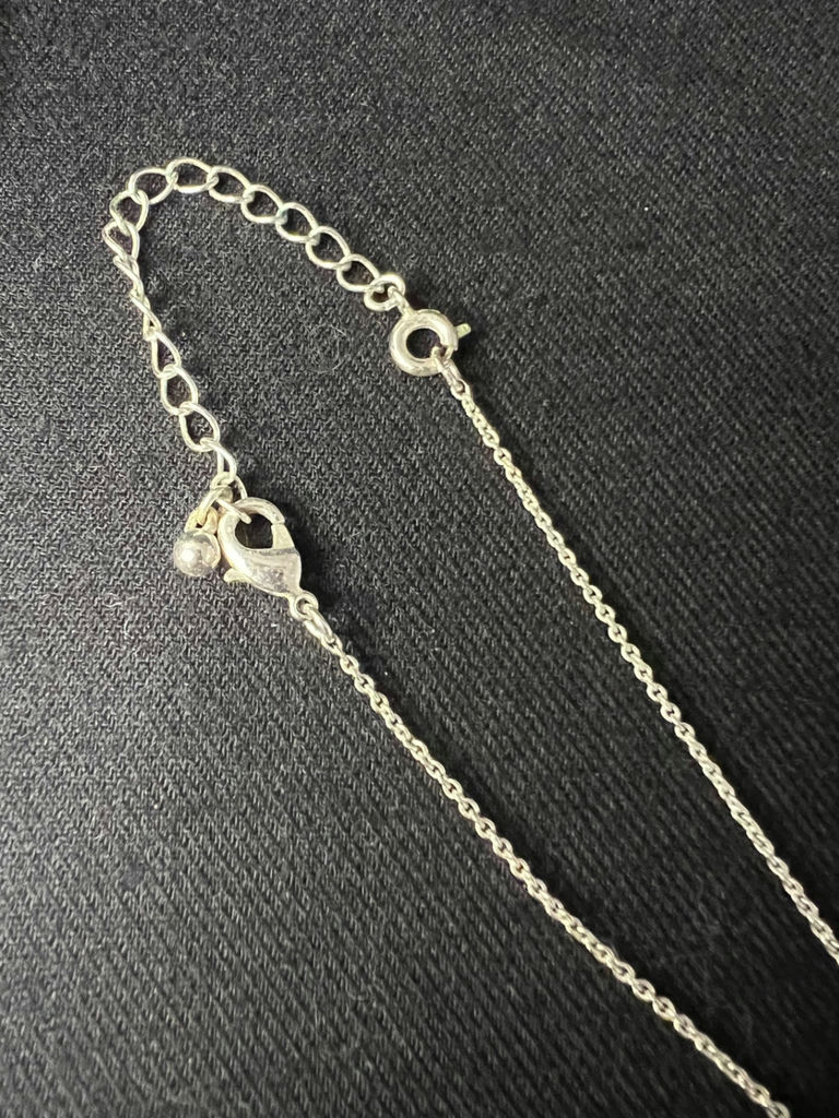 Silver-tone necklace with crystal drop pendant and one pair of shell earrings (blue enamel and gold-tone) - image 2 of 6