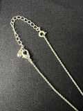 Silver-tone necklace with crystal drop pendant and one pair of shell earrings (blue enamel and gold-tone) - thumbnail 2 of 6