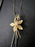 Gold-tone floral pendant necklace, two multicolor beaded necklaces, and matching bead earrings - thumbnail 4 of 13