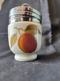 Vintage carafe, hand-painted glass storage jars, and ceramic condiment jars with floral and fruit designs - thumbnail 5 of 7