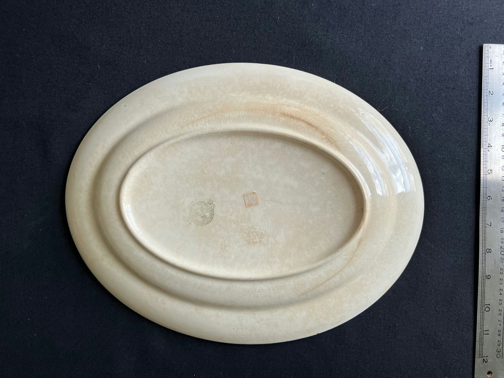 Ceramic dishware set with scalloped bowls and decorative plates - image 6 of 8
