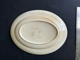 Ceramic dishware set with scalloped bowls and decorative plates - thumbnail 6 of 8
