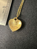 Gold-tone jewelry collection with heart pendant, charm bracelet, and drop earrings - thumbnail 5 of 18
