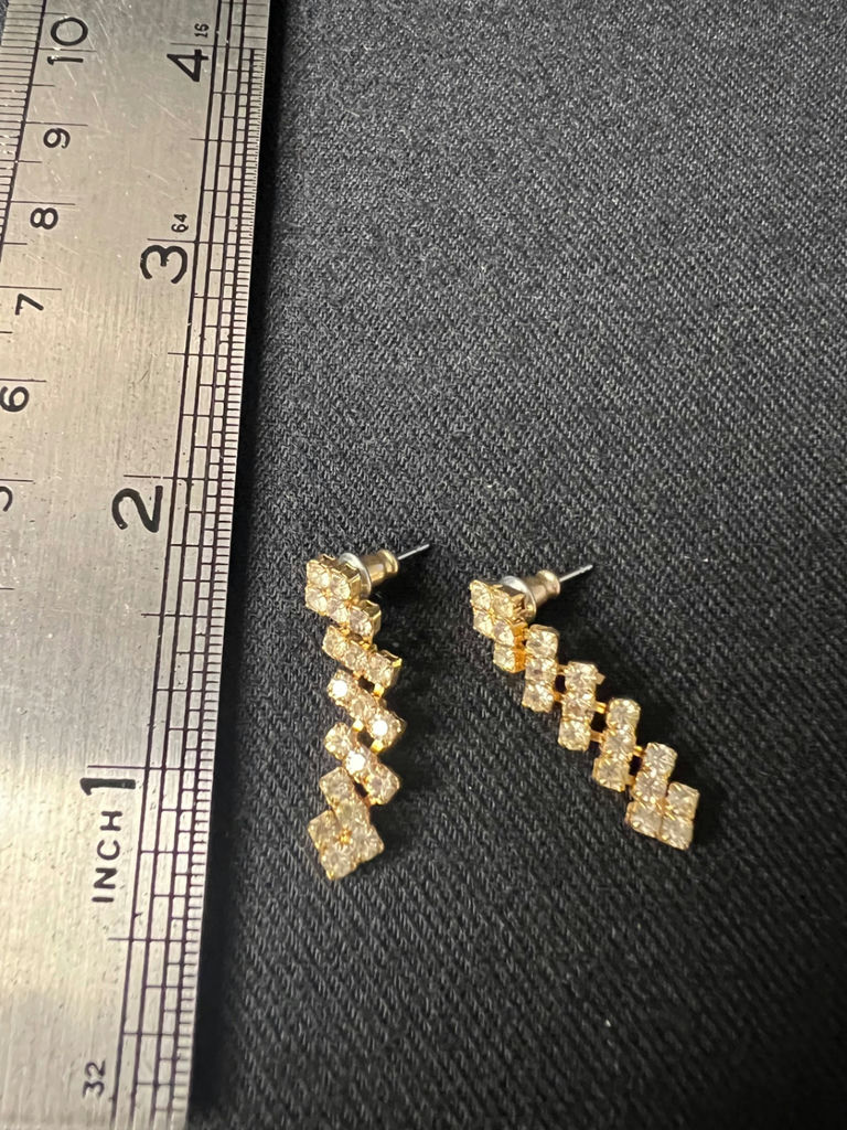 Gold-tone jewelry collection with heart pendant, charm bracelet, and drop earrings - image 17 of 18