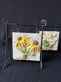 Floral embossed ceramic tiles on metal display stands, sculpted ceramic yellow rose - thumbnail 6 of 13