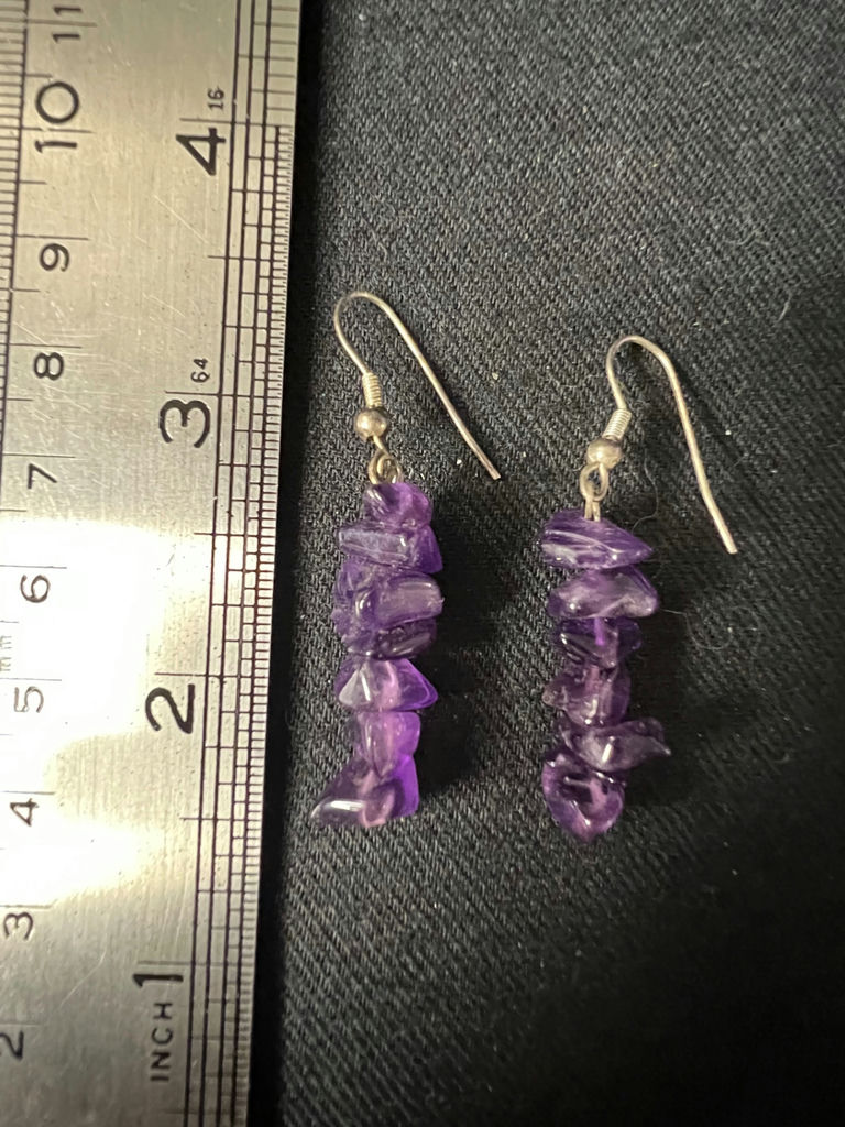 Gold-tone cameo pendant necklace with floral center, purple chip earrings, and two-tone circular earrings - image 9 of 11