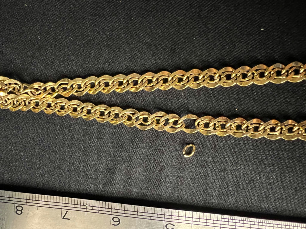 One gold-tone curb-link chain necklace with loose link - image 2 of 5