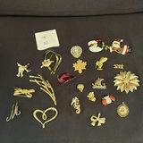 Assortment Of Gold Plated Brooches - thumbnail 1 of 11