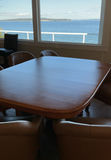Solid Wood Pedestal Table, 6 ‘leather’ Rolling Barrel Chairs - thumbnail 12 of 12