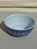 Vintage Blue Pyrex Glass Mixing Bowl with White Floral Pattern - thumbnail 1 of 4