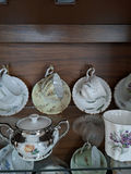 Assorted Floral China Teacups, Saucers, Sugar Bowl, and Creamer - thumbnail 5 of 10
