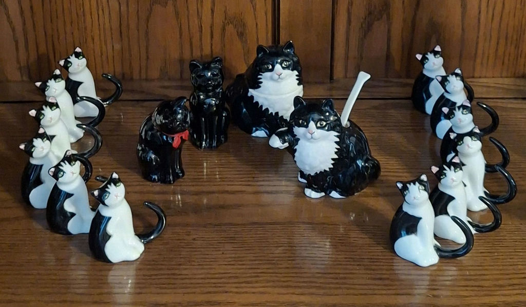 Collection of Black and White Cat Figurines - image 1 of 7